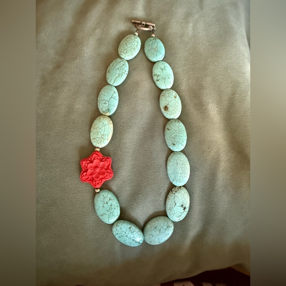 Turquoise Necklace with Red Floral Accent